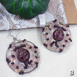 coccinella intreccio orecchini fatti a mano particolari pendenti originali artigianali con pietre pasta vetro rosa ametista e perline di conteria