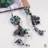 orecchini fatti a mano particolari pendenti originali artigianali con pietre tipo-lava corda cristalli nero verdino perline luminose