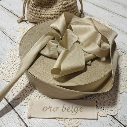 shop fettuccia oro beige maglina stafil jersey borse cestini tappeti uncinetto scaldacollo collane pochette clutch bags abbigliamento moda