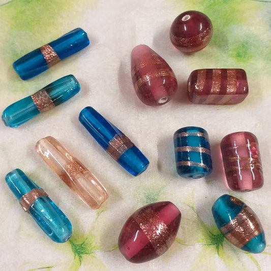 turchese bordeaux rosa cipria fucsia perline assortimento forme colori grandi con brillantini di avventurina perle vetro bigiotteria stile veneziano murano a lume forma goccia tubetto pallina sfera oliva mattoncino