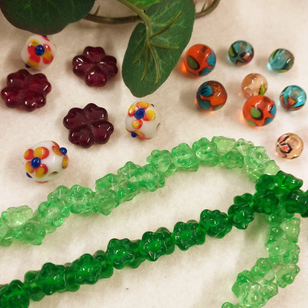 creare bijoux bigiotteria fai da te: orecchini con perle pendagli fiori di  vetro - tigerbazar