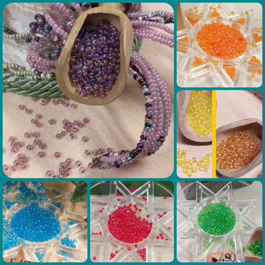 bordeaux rosato arancio giallo rosso azzurro verde colori cangianti iridati iridescenti arcobaleno perline conteria veneziana vetro rocailles lavori creazioni fiori animaletti tessitura tissage danese bamboline di perle