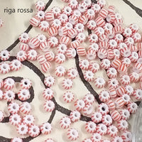 riga rossa rocailles in vetro perline indiane conteria veneziana hobby bijoux fiori Venezia piante alberi bonsai particolari esclusive per bigiotteria gioielli di perle
