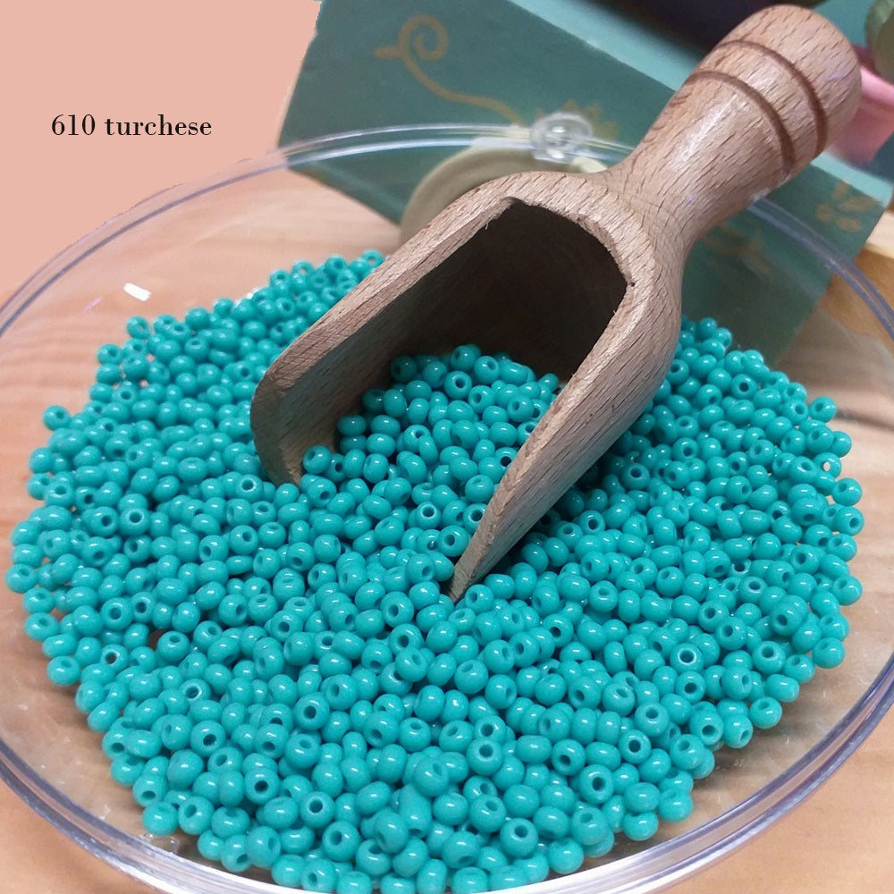 turchese colore acquamarino rocailles perline in vetro lucido conteria uso creazioni fiori Venezia gioielli bijoux hobby alberelli piante bonsai di perle natalizi