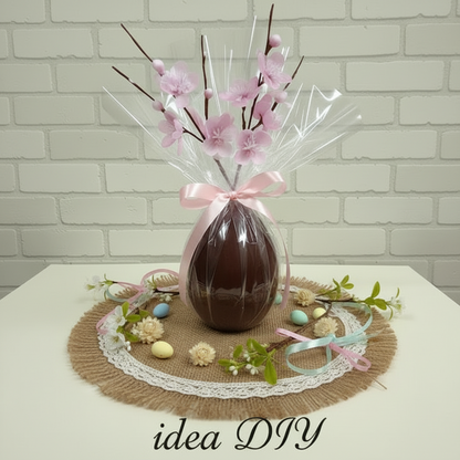 come confezionare uovo di cioccolato di pasticceria con fiore di pesco rametto mazzolino bouquet ramo mazzetto di fiori di stoffa rosa con fiocco di nastro 