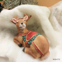renna terracotta ceramica uso animali del bosco per decorazioni con Babbo Natale fai da te addobbi natalizi vetrine fondale nastro tessuto feltro vello bianco effetto neve