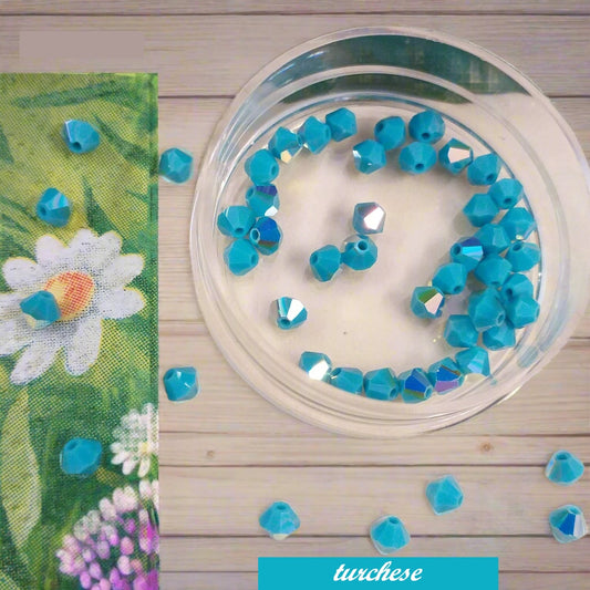 rombetti Swarovski 4 mm perline bicono uso creare lavorazione artigianale orecchini anelli gioielli bijoux di bigiotteria perle turchese cristalli perlati