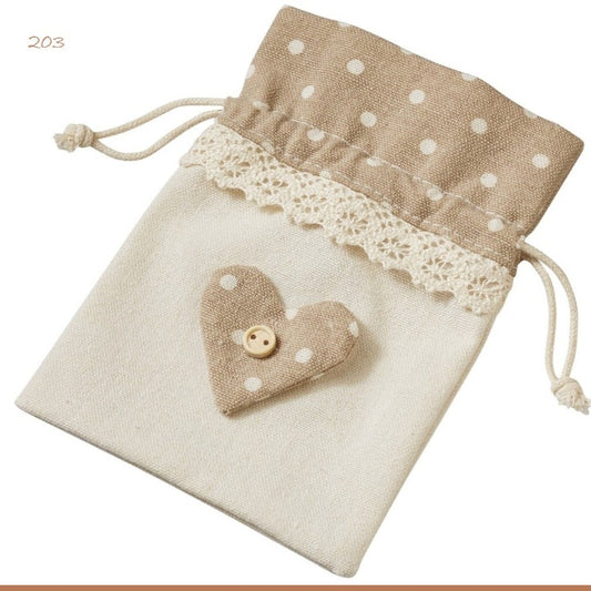 sacchetti tessuto per bomboniere juta fantasia cuoricini pois pizzo colore tortora uso confezionamento packaging enogastronomia portapourri lavanda portaconfetti prima comunione cresima battesimo matrimonio