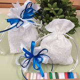 guarnizione bianco blu sacchetto bianco organza imbottito portaconfetti matrimonio comunione cresima coccarda fiocco nastro confezionato confetti o vendita in kit confezionamento fai da te uso portariso portalavanda bomboniere