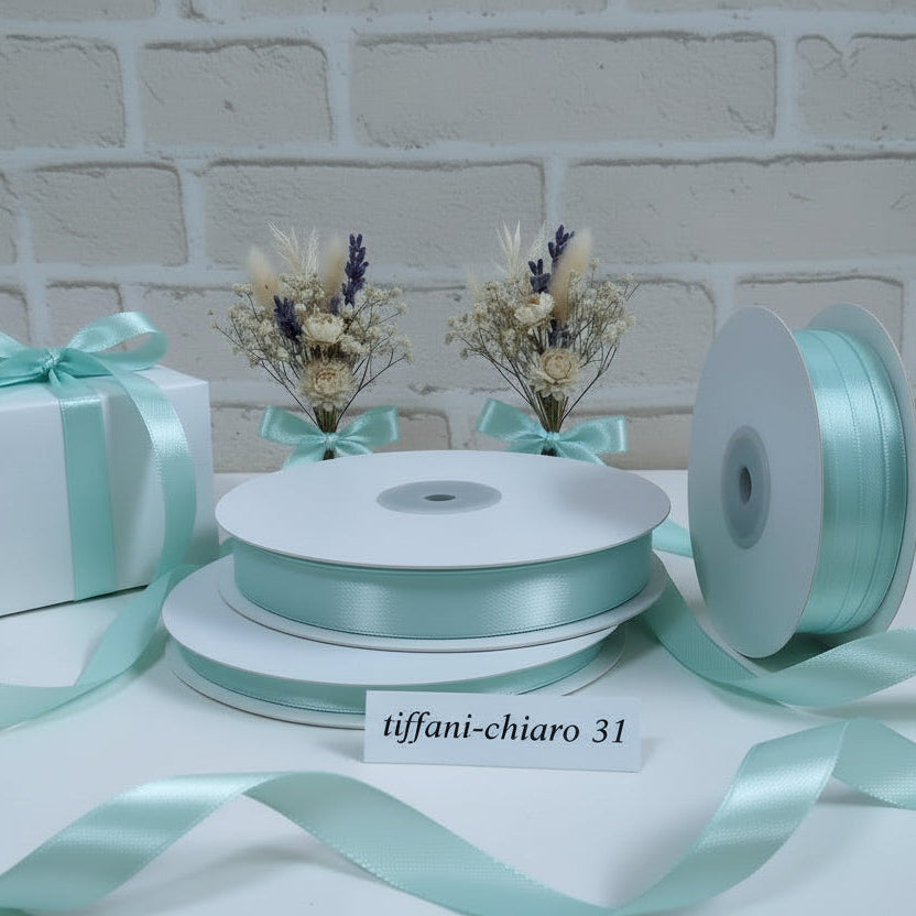 tiffani-chiaro vetrina negozio online nastro raso bomboniere fai da te hobby creativi nastrini decorazioni matrimonio colori assortiti uso confezionare regali Natale uova Pasquali packaging confezionamento
