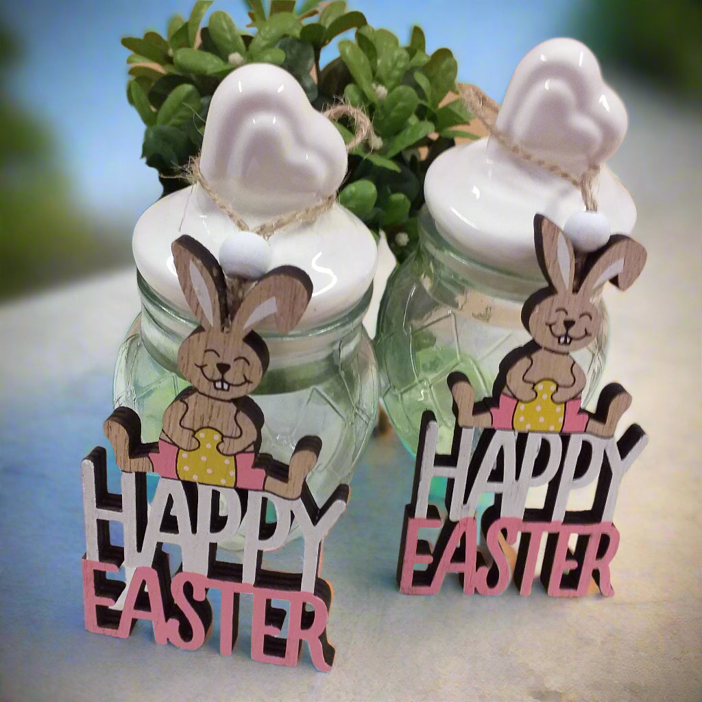 vasetti vetro tappo ceramica bianca cuore idee regalo coniglietti legno colorato ovetti ciondoli perla uso chiudipacco segnaposto pasquale decorazioni addobbi vetrine confezioni packaging