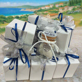 vasetto barattolo sughero tappo con scritte confezionato confetti bianchi ciondolo cuoricino albero della vita nastrino blu e argento nella scatolina per venticinquesimo anniversario matrimonio nozze d'argento 25°