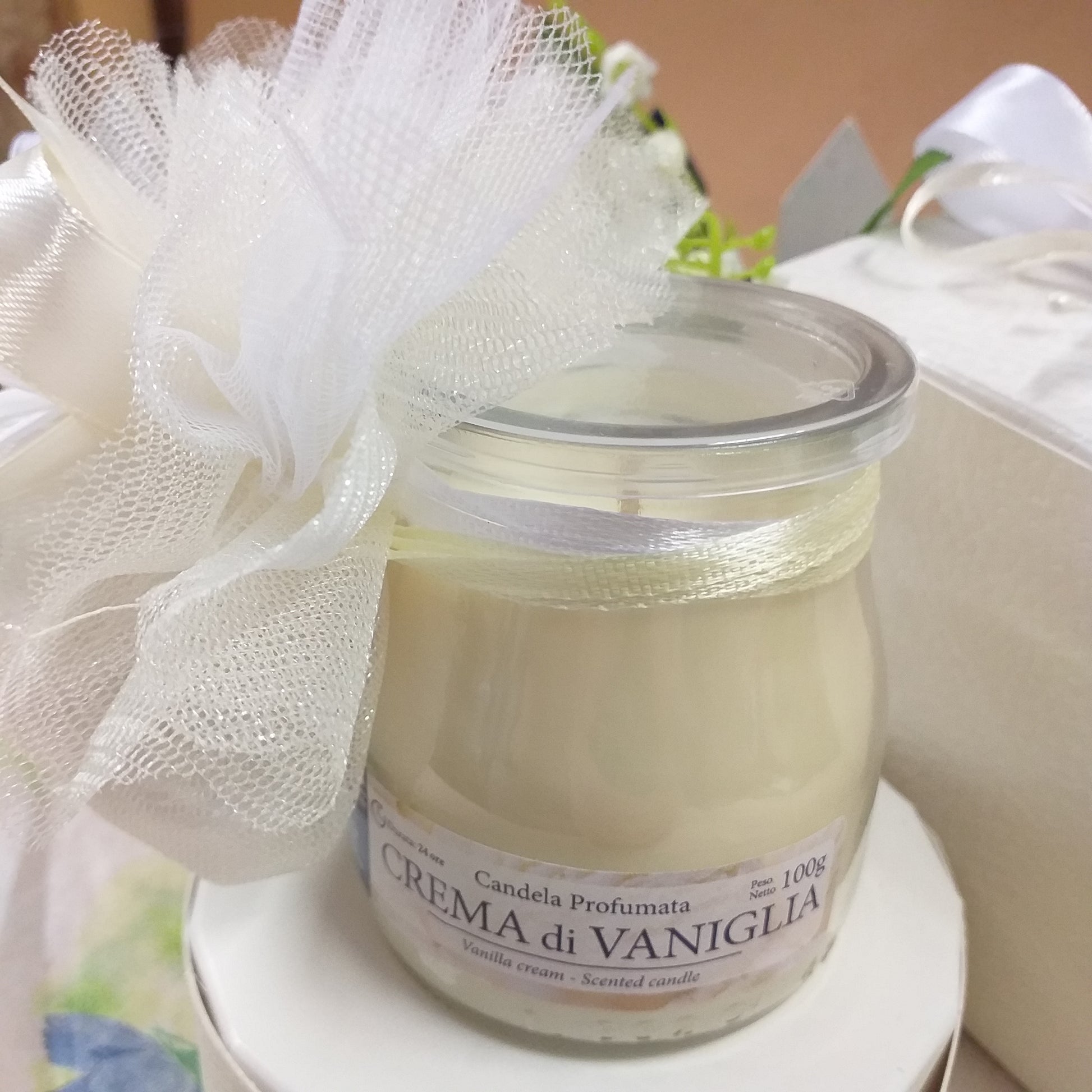 ciuffo sacchetto confetti e packaging vasetto vetro barattolo candela profumata bomboniera crema vaniglia uso fai da te o confezionata per matrimonio comunione cresima laurea 18 anni compleanno anniversario nozze