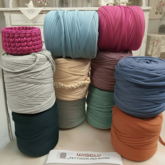 lilla pastelli burro beige rosa verde blu avio viola ottanio cucirini tre stelle wiggly fettuccia borse uncinetto filato cotone elastico crochet bag clutch progetti pochette borsette da sera cerimonia natalizie cestini pasquali tappeti arancione