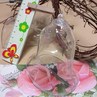 campana media 9 cm plastica trasparente apribile divisibile plexiglass uso decorazioni pasquali riempire con uova cioccolato packaging confezioni regalo e vetrine enogastronomia