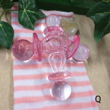 offerta Q lotto 4 oggetti forma ciuccio bebè shop online negozio ricordini oggettini regalini bomboniere baby shower nascita Battesimo assortimento bimba femminuccia rosa