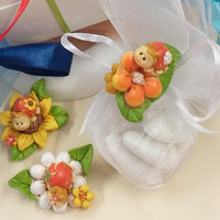 coccinelle portafortuna oggettini su fiore effetto-ceramica bomboniere fai da te e confezionate confetti Battesimo matrimonio laurea comunione