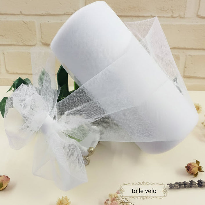 colore bianco tulle rete fai da te bomboniere confezioni regalo decorativo tessuto ad uso fiocchi nascita vendita a rotolo runner uso vetrinistica packaging hobbistica creativa creare vestitini bambole di stoffa e pezza