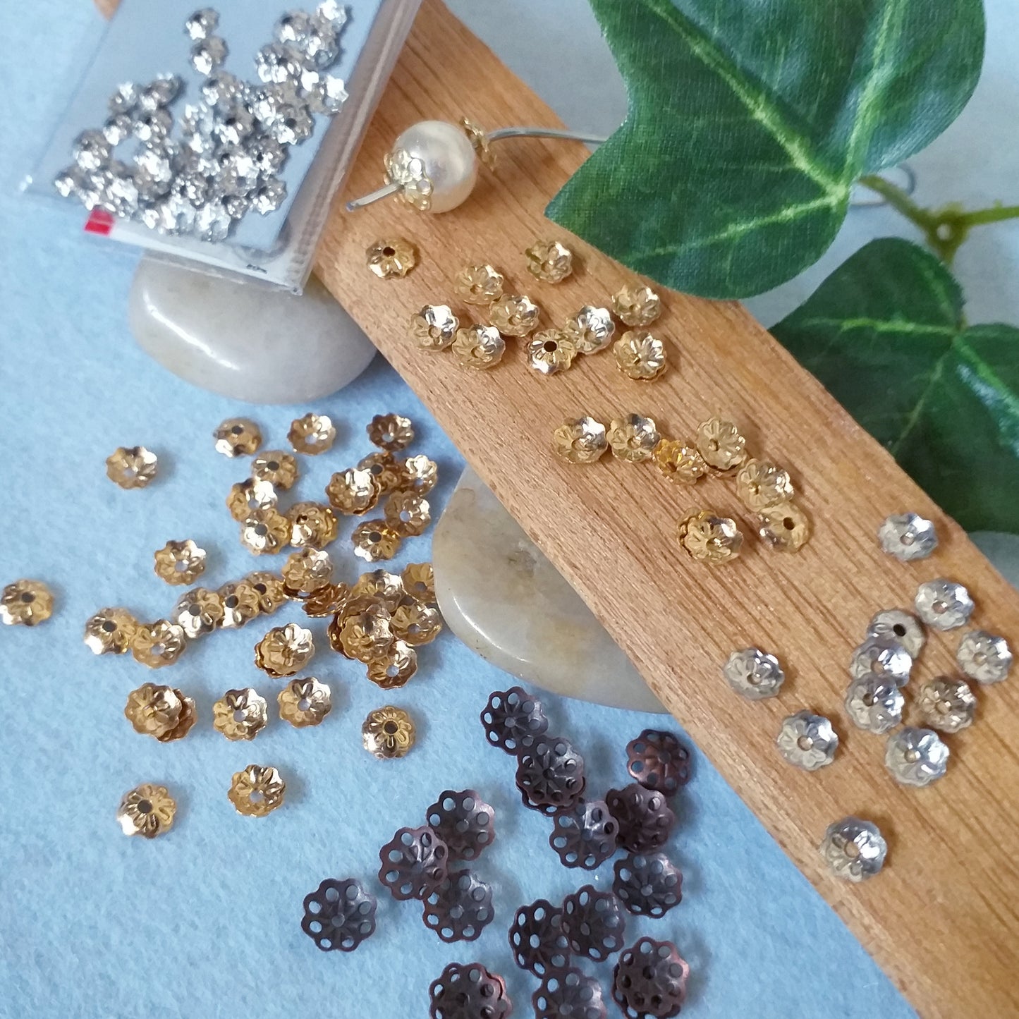 metallo oro argento rame negozio coppette bigiotteria fiori metallo cappette filigrana copriperla stelline collane uso fai da te bijoux angioletti