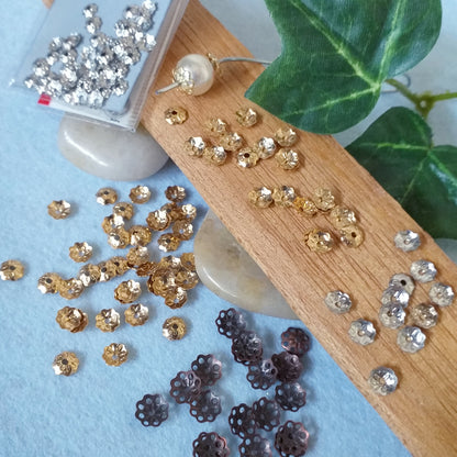 metallo oro argento rame negozio coppette bigiotteria fiori metallo cappette filigrana copriperla stelline collane uso fai da te bijoux angioletti