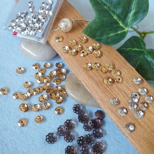 metallo oro argento rame negozio coppette bigiotteria fiori metallo cappette filigrana copriperla stelline collane uso fai da te bijoux angioletti