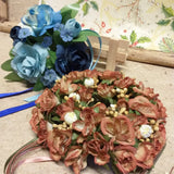 ghirlande anelli di rose fiori pesca tortora blu nastri per decorare candele Natale con materiali accessori creativi su portacandele