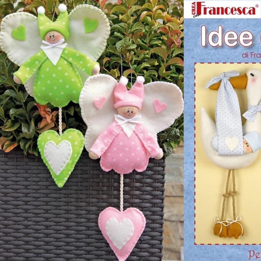 farfallina modello bambole di pannolenci da creare con tessuto di feltro sottile testine disegnate pompon perline legno