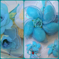 idee con azzurro celeste racchette portaconfetti di tulle foglie petali gambo colorato per confezionamento fiori segnaposto scatole bomboniere battesimo nascita comunione bambino