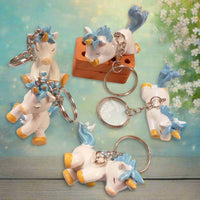 unicorno portachiavi bianco celeste lotto di offerta stock bomboniere celeste per maschio bimbo ricordini baby shower Battesimo oggetti regalini nascita