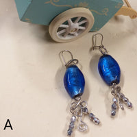 shop online retrò orecchini particolari artigianali bigiotteria etnica perline colorate perle blu cristalli argento pietre vetro, metallo wire