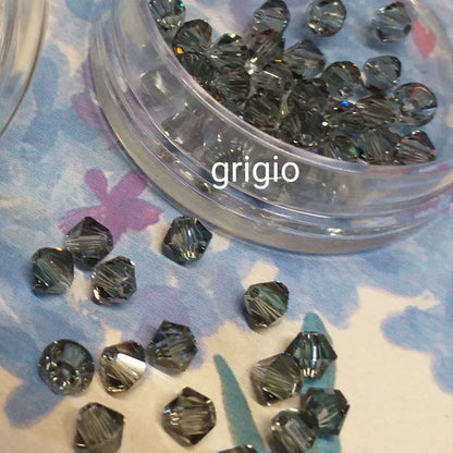 perle swarovski 4 mm per bigiotteria rombetti bicono perline smeraldo grigio uso per lavorazione artigianale orecchini anelli