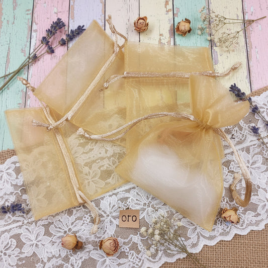 Colore oro bustine organza sacchettini porta confetti porta lavanda porta petali fiori profumati uso confezionamento confetti bomboniere packaging regalini anniversario nozze oro matrimonio cinquantesimo