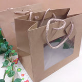 scatole shopper bomboniere buste regalo di cartoncino cartone kraft avana beige con manici corda e finestra trasparente wedding box da matrimonio