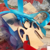 scatolina segnaposto bomboniere aprifesta ciondolo Angelo legno stilizzato angioletto con ali confetti bigliettino stampato confezionamento per Battesimo bimbo maschietto